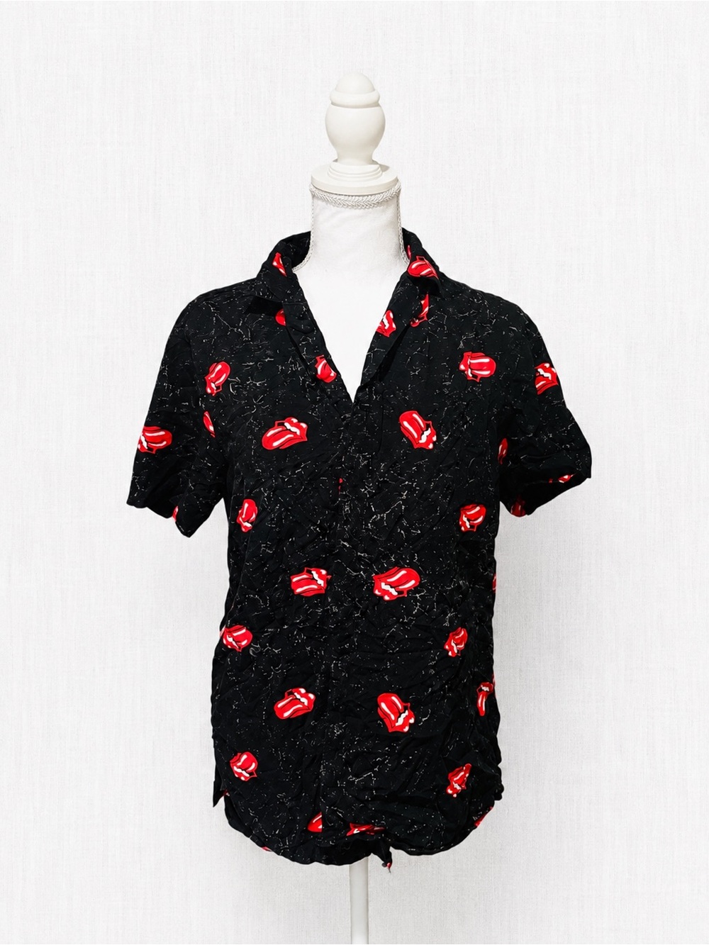 the Rolling Stones Black Short-Sleeve Button-Down Shirt with Red Tongue Motif